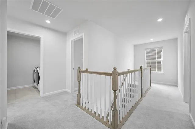 a view of a hallway with closet