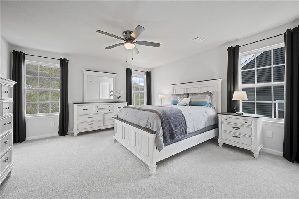 440 Sarjean Way Zelienople, PA 16063 - Photo 21 of 50 The upper-level offers a large primary suite with two walk-ins and an elegant en suite.