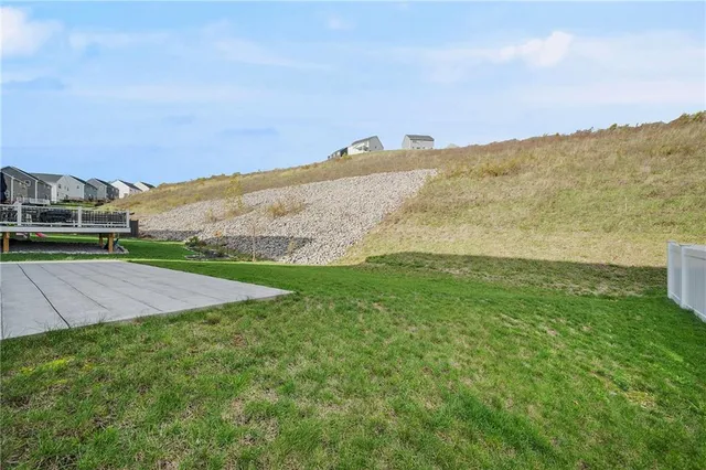 an aerial view of residential house with outdoor space