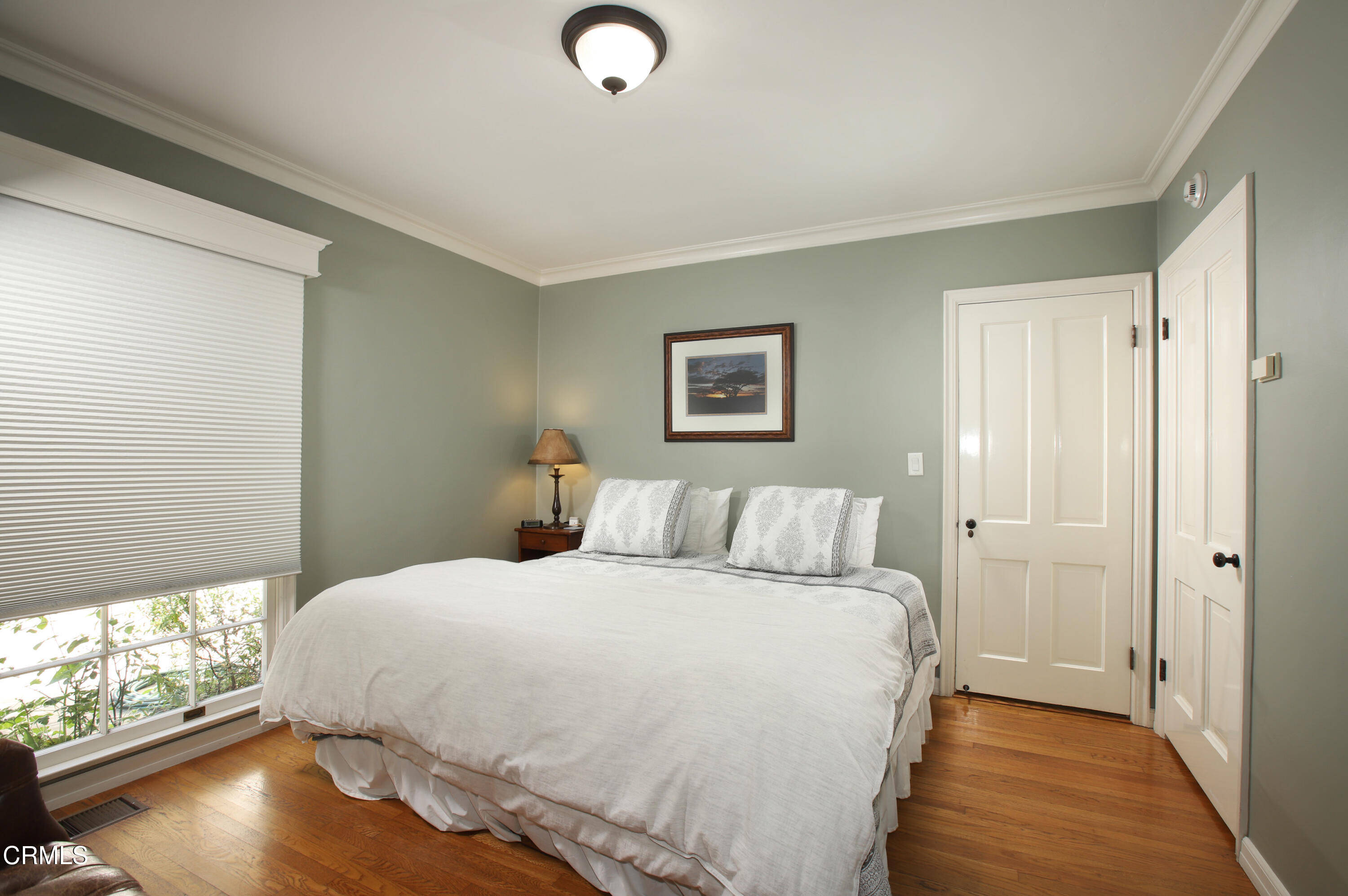 181 Sierra View Road Pasadena, CA 91105 - Photo 16 of 41 a bedroom with a bed and a large window