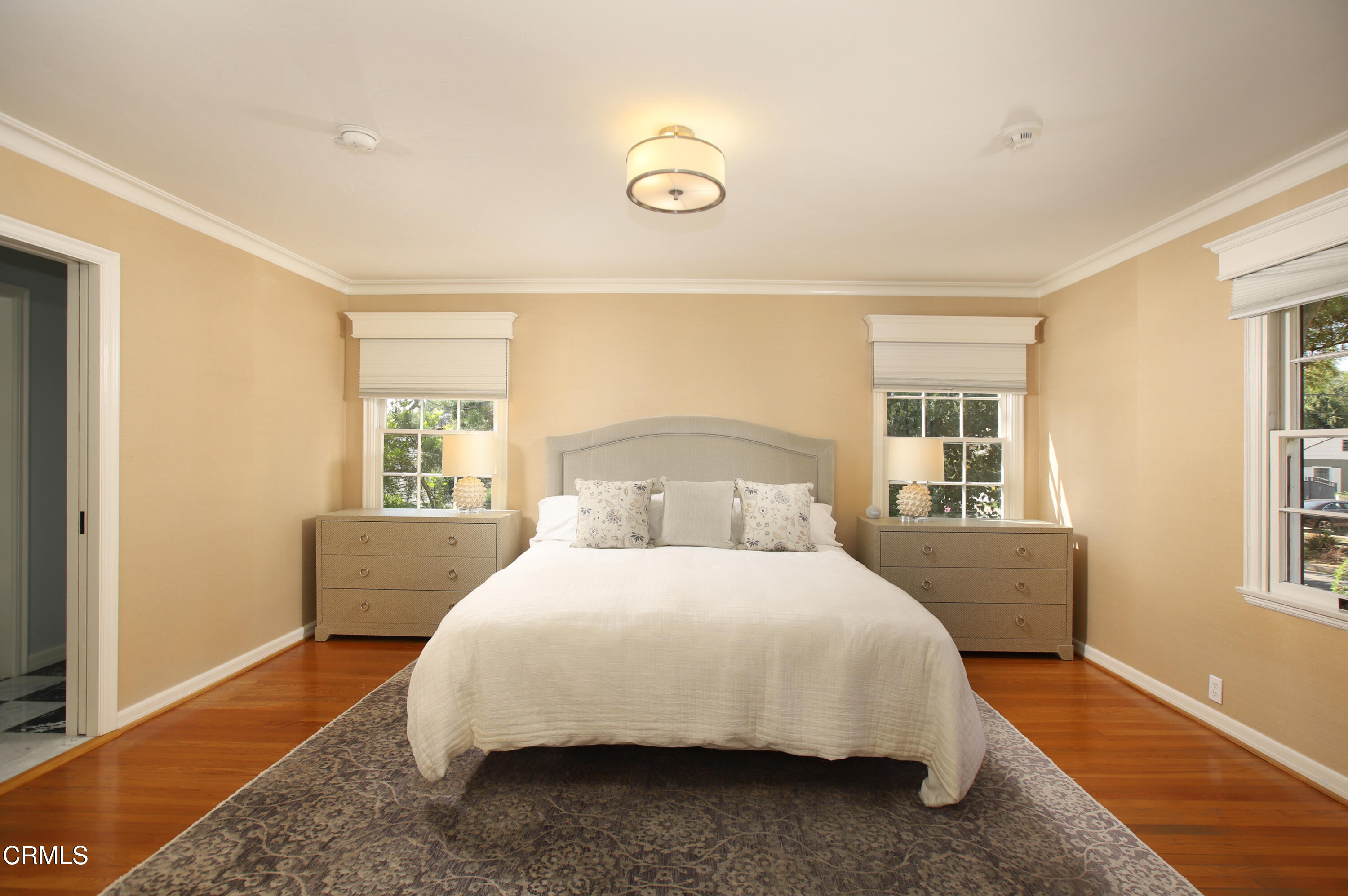 181 Sierra View Road Pasadena, CA 91105 - Photo 20 of 41 a bedroom with a bed and a couch