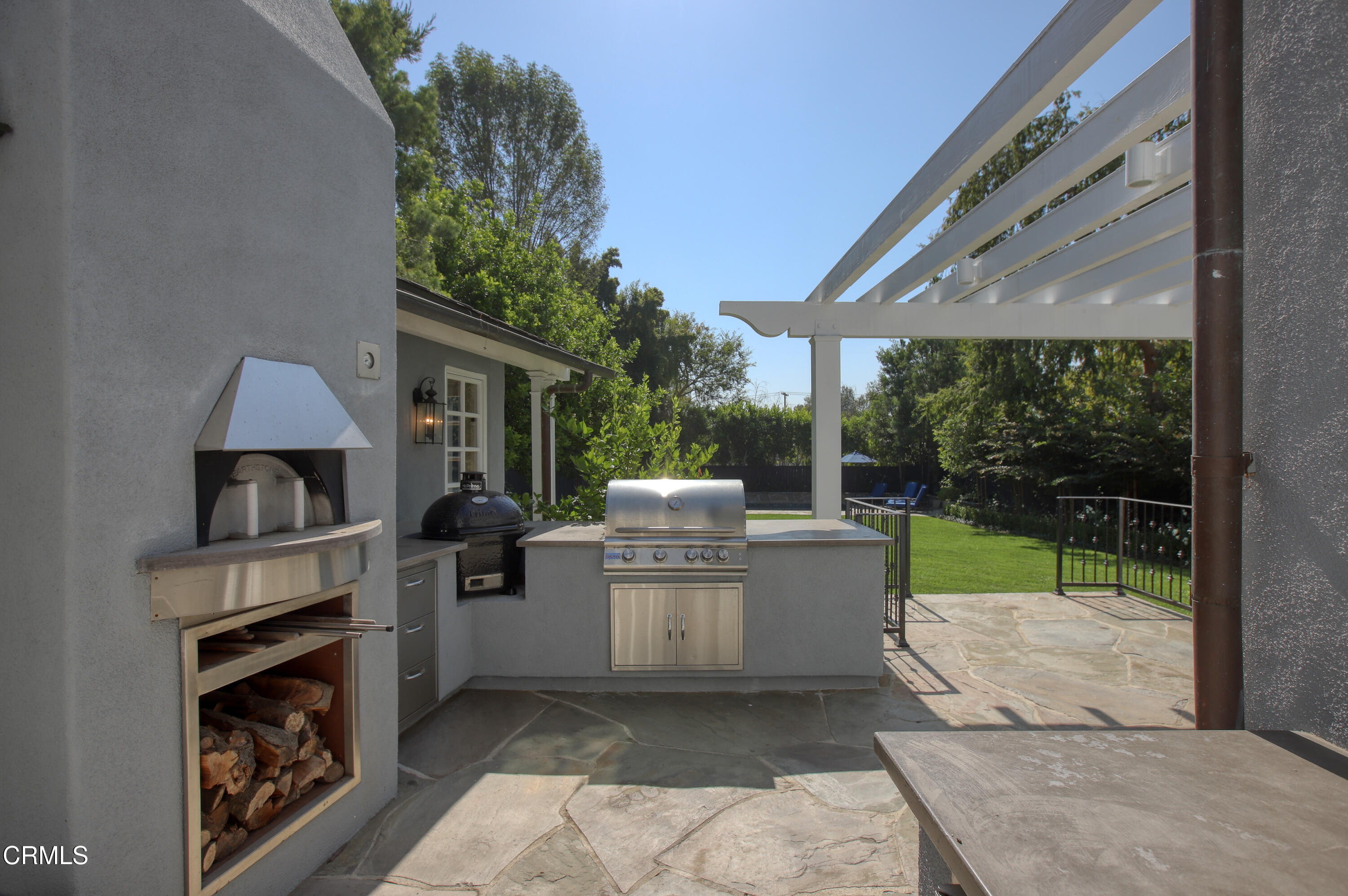 181 Sierra View Road Pasadena, CA 91105 - Photo 30 of 41 a view of a patio with furniture and garden