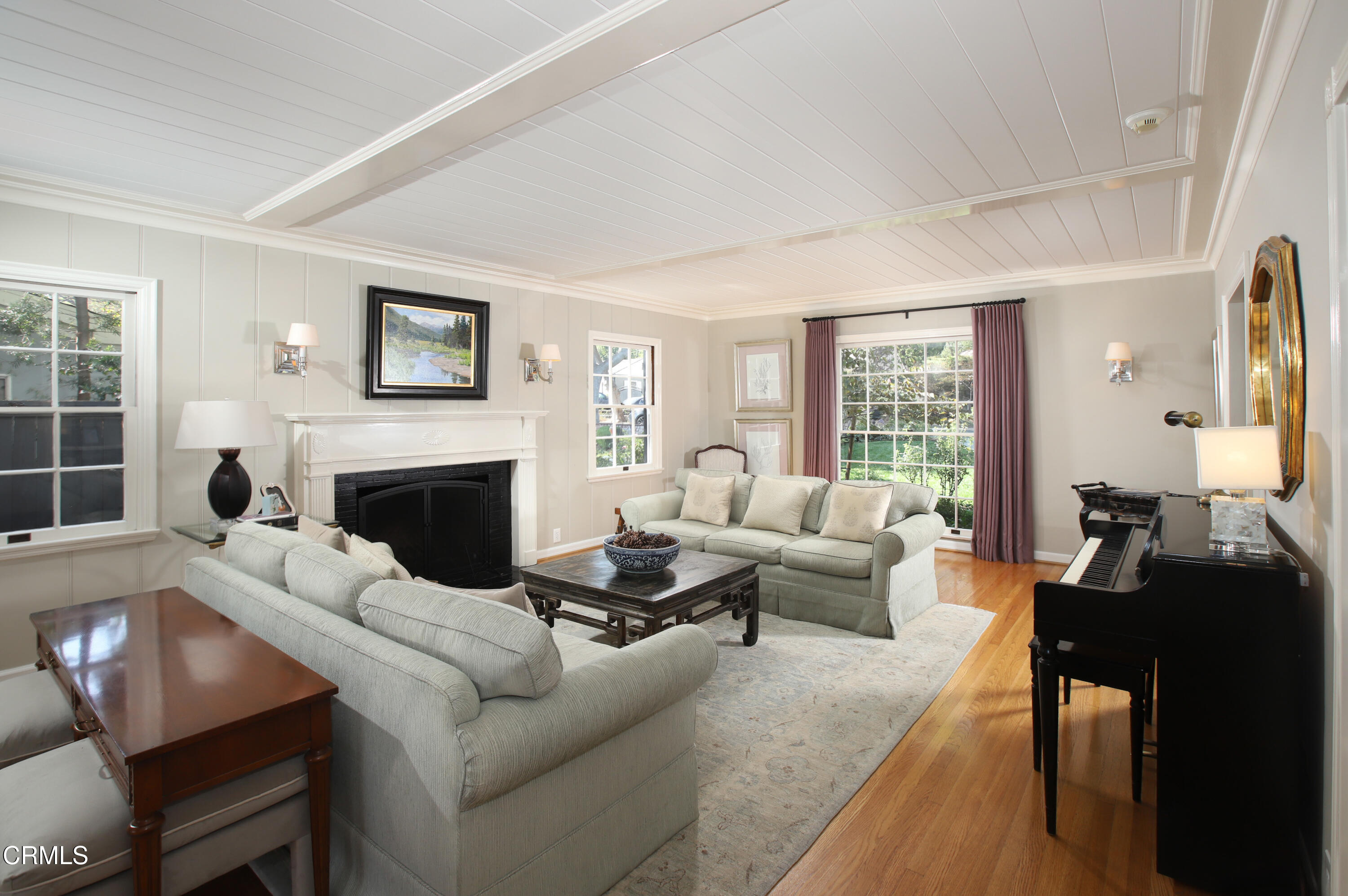 181 Sierra View Road Pasadena, CA 91105 - Photo 5 of 41 a living room with furniture a fireplace and a large window
