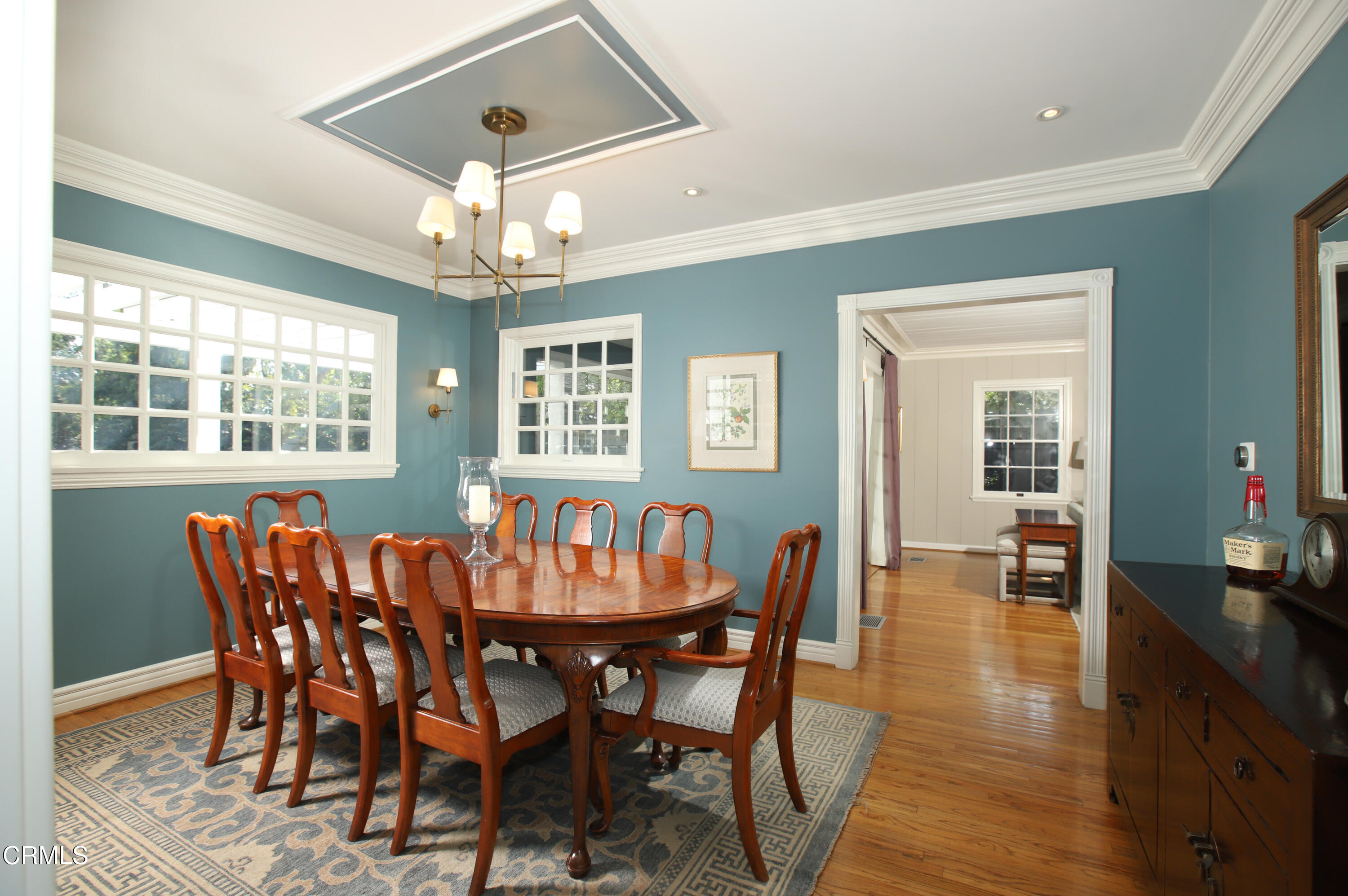 181 Sierra View Road Pasadena, CA 91105 - Photo 7 of 41 a view of a dining room with furniture wooden floor and chandelier