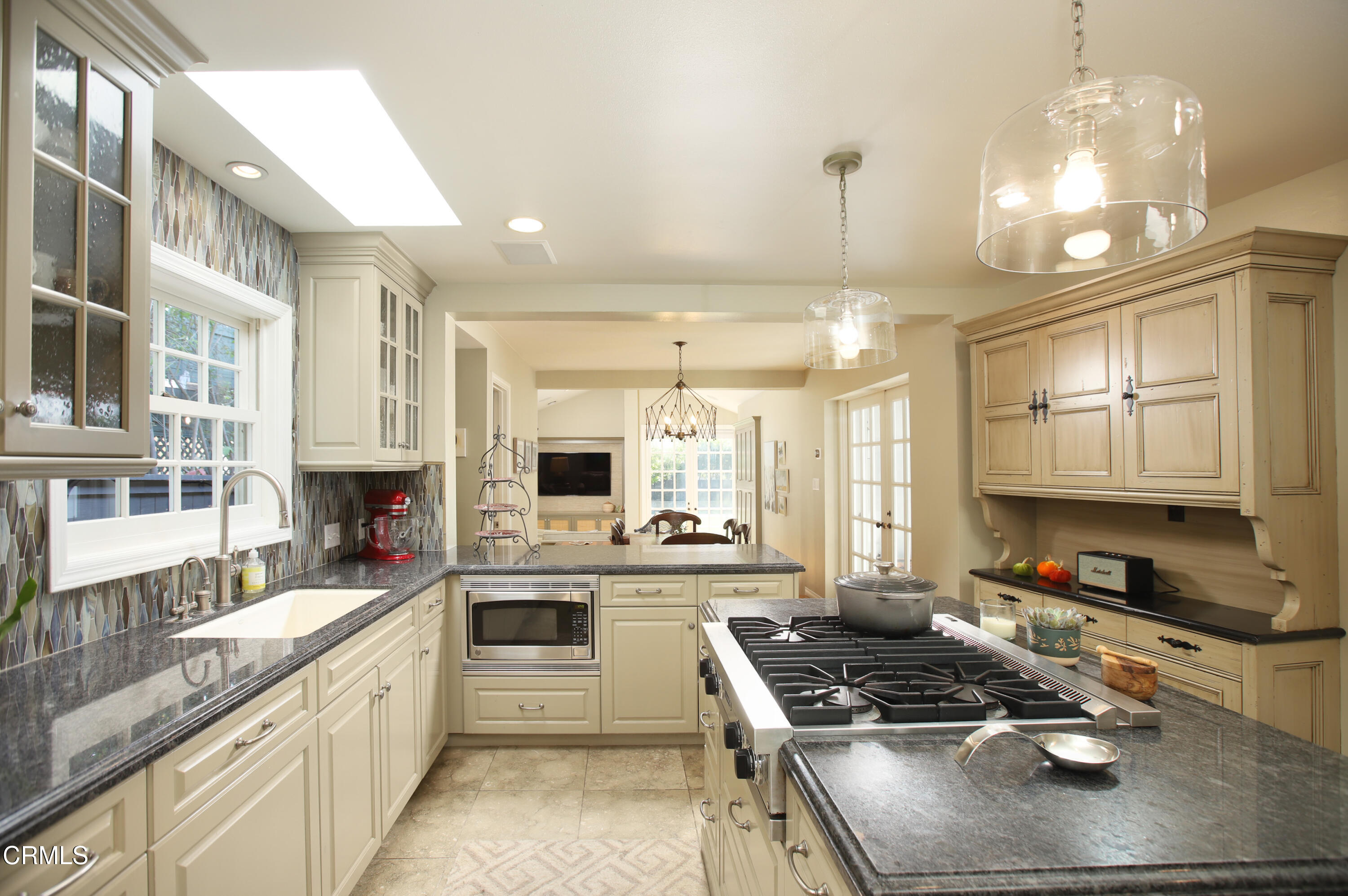 181 Sierra View Road Pasadena, CA 91105 - Photo 10 of 41 a kitchen with stainless steel appliances granite countertop a stove and a sink