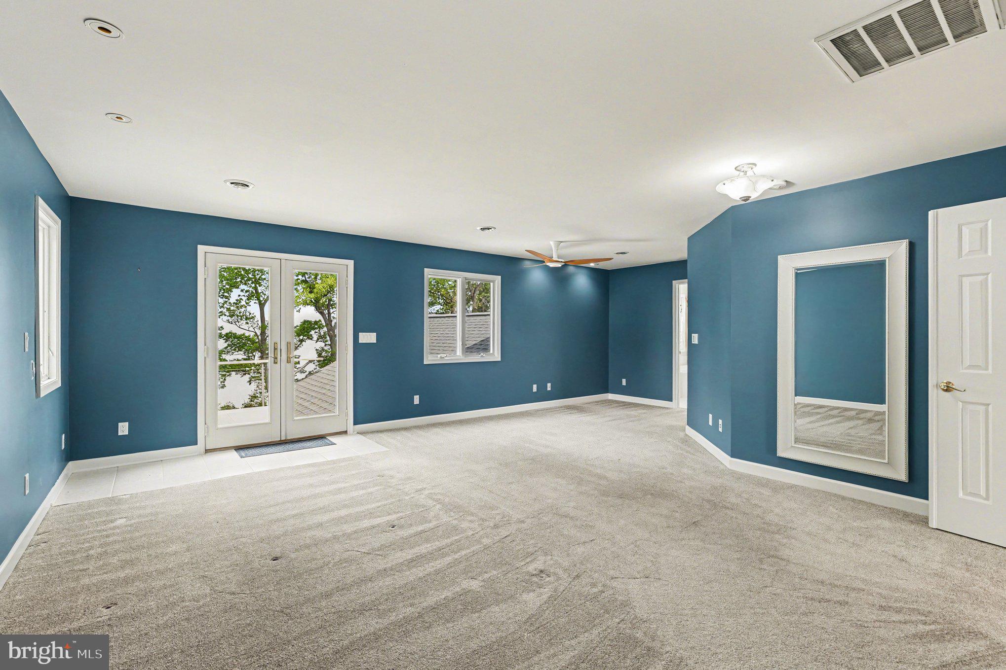 16186 Bundock Road King George, VA 22485 - Photo 32 of 82 Spacious room with serene blue walls.