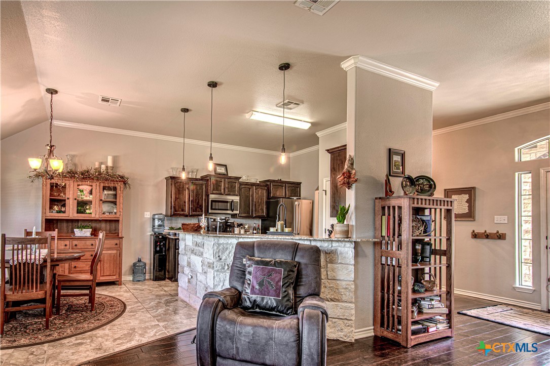 412 Dandridge Drive Temple, TX 76502 - Photo 14 of 44 a room with lots of chairs and mirrors