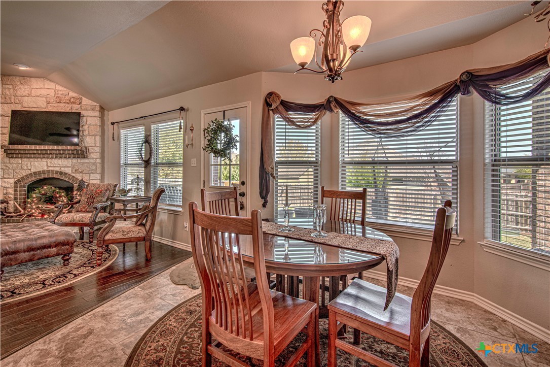 412 Dandridge Drive Temple, TX 76502 - Photo 15 of 44 a view of a dining room with furniture window and outside view