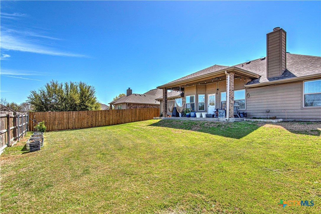 412 Dandridge Drive Temple, TX 76502 - Photo 37 of 44 a view of a house with swimming pool and sitting area