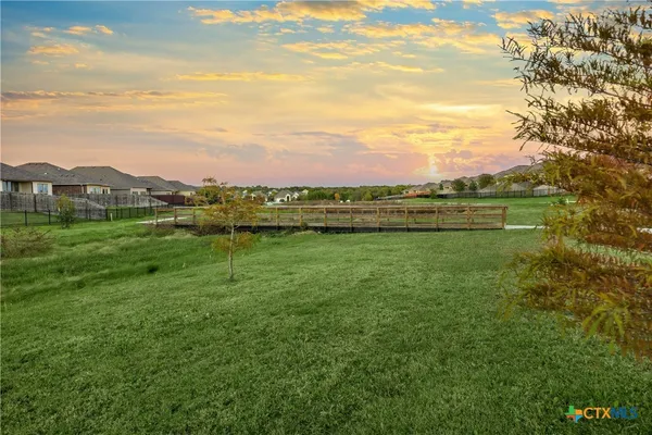 a view of a lake with a houses