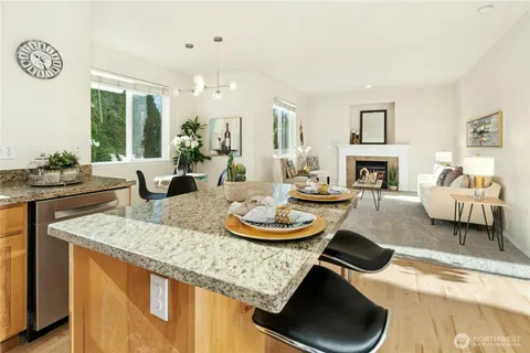 a room with furniture and a wooden floor