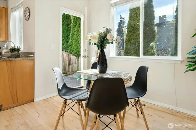 a view of a dining room with furniture window and outside view
