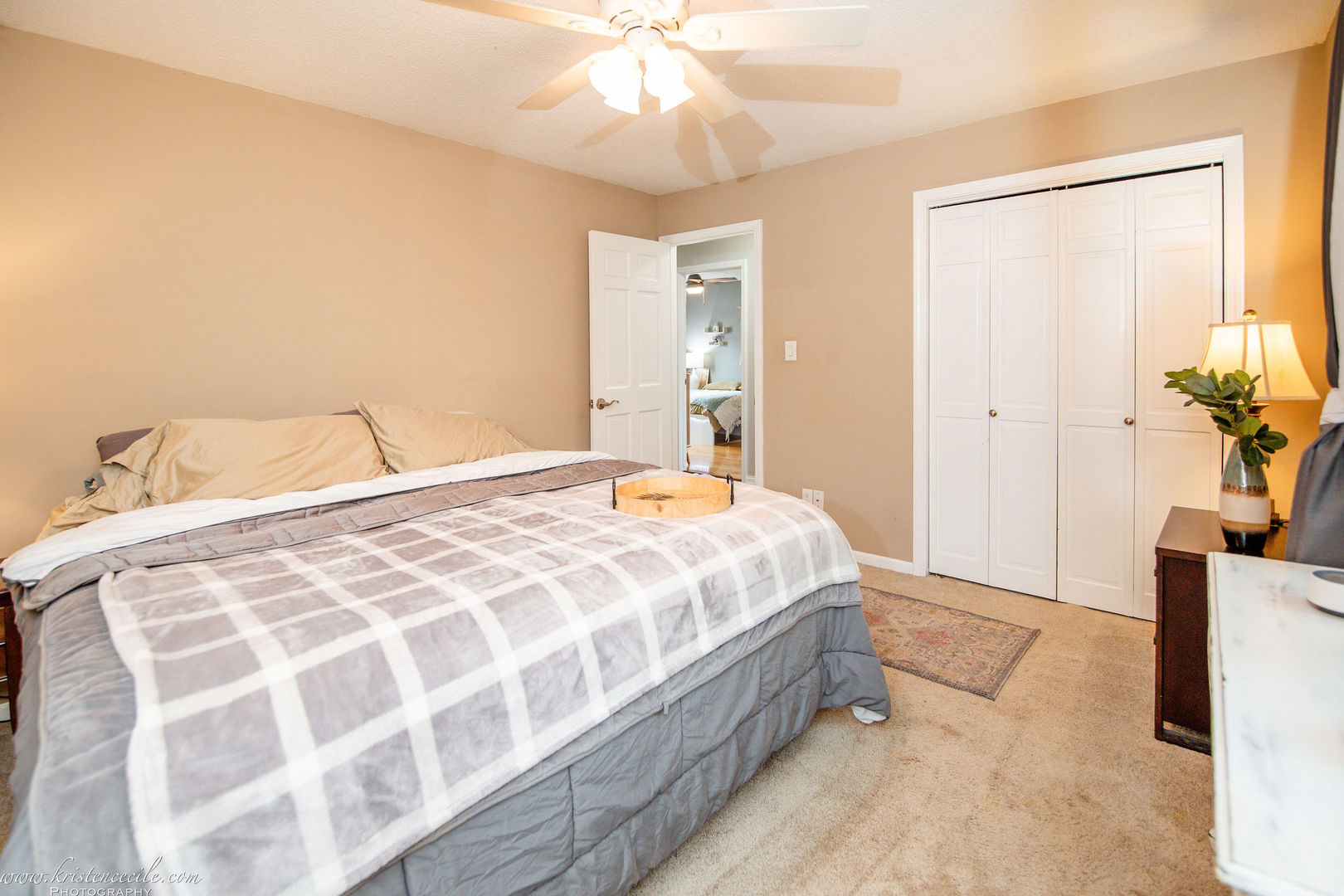 5 Inverness Drive Bourbonnais, IL 60914 - Photo 37 of 90 a bedroom with a bed and a chandelier