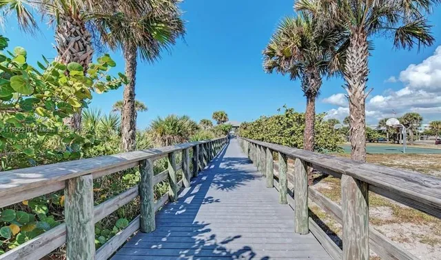 a view of a balcony with an ocean view