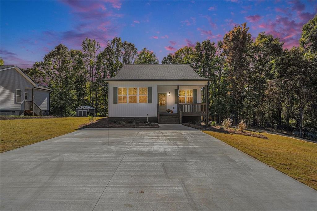 3610 South Bend Road Gainesville, GA 30506 - Photo 1 of 1 a front view of a house with yard and trees