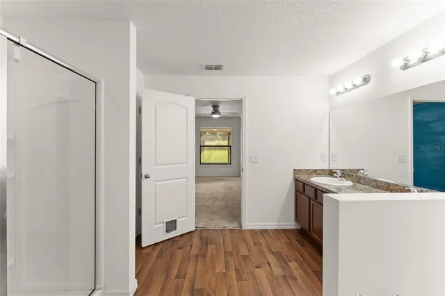 a view of a room with racks on the wall