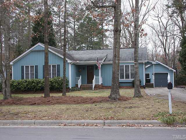 7517 Old Hundred Road Raleigh, NC 27613 - Photo 1 of 12 a view of a house with a yard and large tree