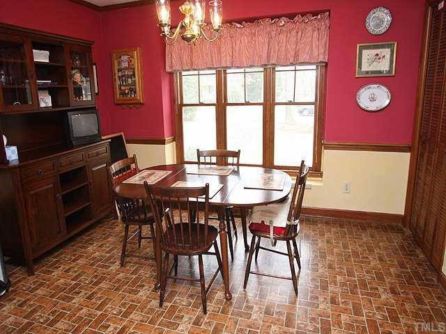 7517 Old Hundred Road Raleigh, NC 27613 - Photo 3 of 12 a dining room with furniture and window