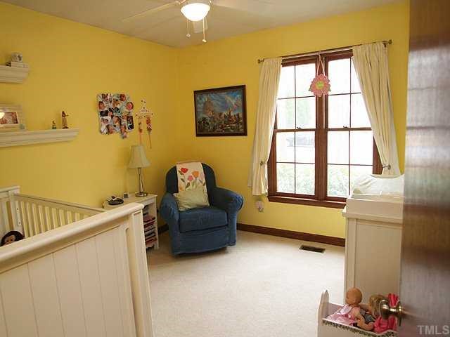 7517 Old Hundred Road Raleigh, NC 27613 - Photo 8 of 12 a living room with furniture and a window