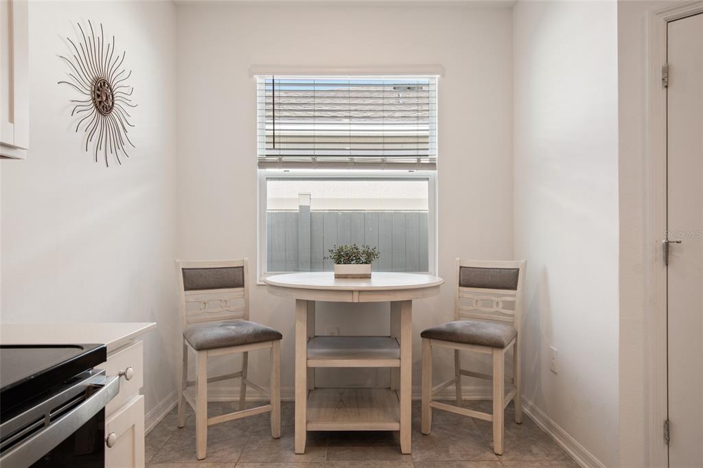 1172 Tyler Loop Lake Wales, FL 33859 - Photo 12 of 56 a room with a table and chairs