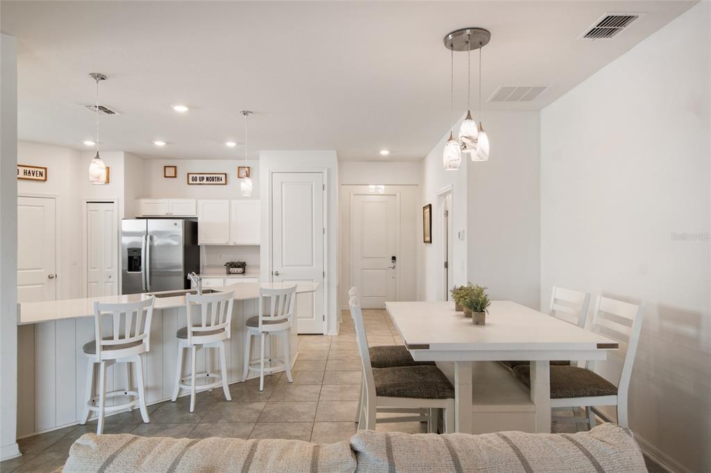 1172 Tyler Loop Lake Wales, FL 33859 - Photo 17 of 56 a view of a dining room with furniture