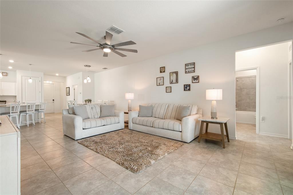 1172 Tyler Loop Lake Wales, FL 33859 - Photo 20 of 56 a living room with furniture and a couch