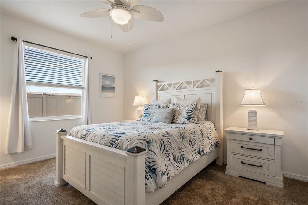 1172 Tyler Loop Lake Wales, FL 33859 - Photo 25 of 56 a bedroom with a bed and a dresser