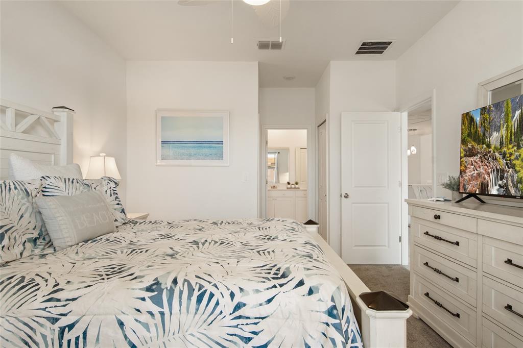 1172 Tyler Loop Lake Wales, FL 33859 - Photo 27 of 56 a bedroom with a bed and a dresser in it