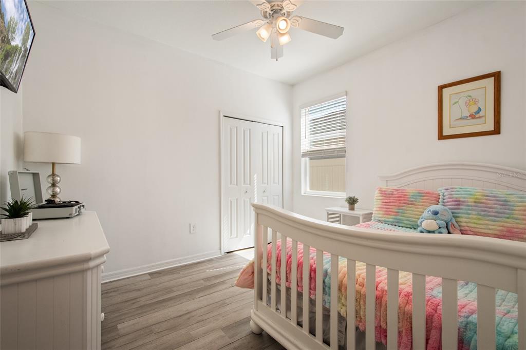 1172 Tyler Loop Lake Wales, FL 33859 - Photo 30 of 56 a bedroom with furniture and a window