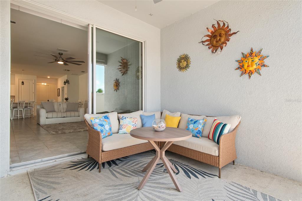 1172 Tyler Loop Lake Wales, FL 33859 - Photo 45 of 56 a living room with patio furniture and a potted plant