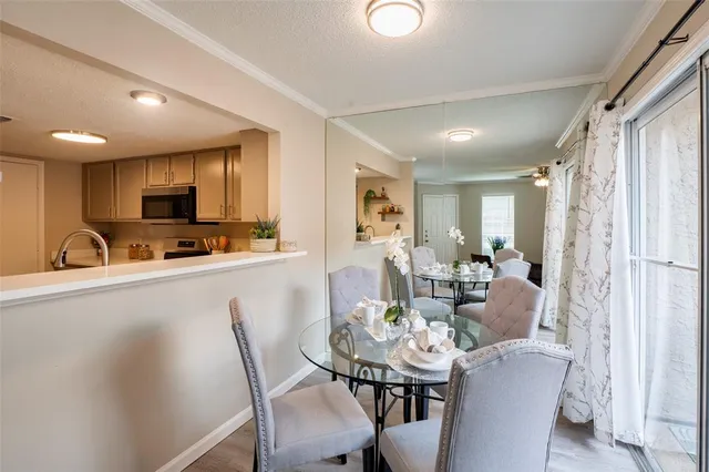 a view of a dining room with furniture
