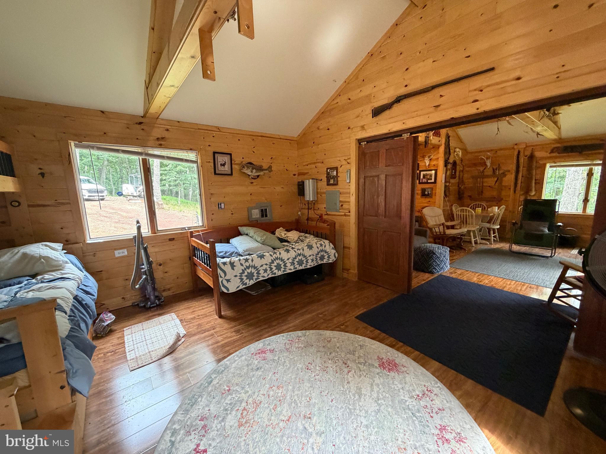 1419 Paul's Woods Road Delray, WV 26714 - Photo 29 of 105 a bedroom with furniture and large windows