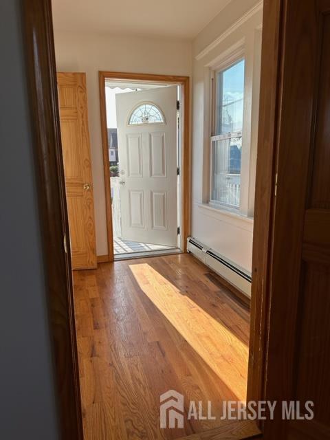 321 Pershing Avenue, Unit 2 Carteret, NJ 07008 - Photo 13 of 16 a view of front door with wooden floor