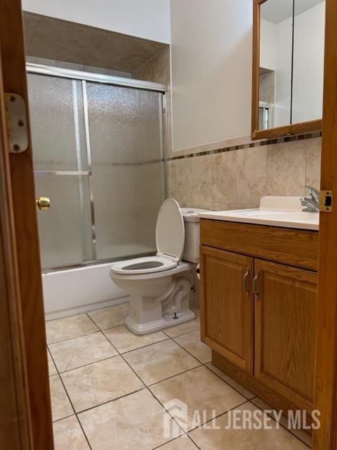 321 Pershing Avenue, Unit 2 Carteret, NJ 07008 - Photo 7 of 16 a bathroom with a toilet and a sink