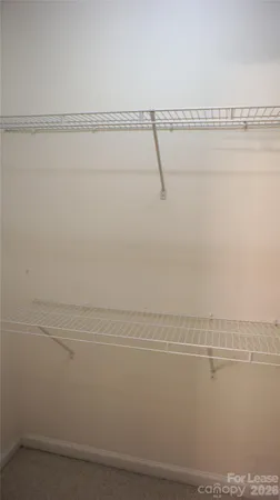 a view of a room with racks on the wall