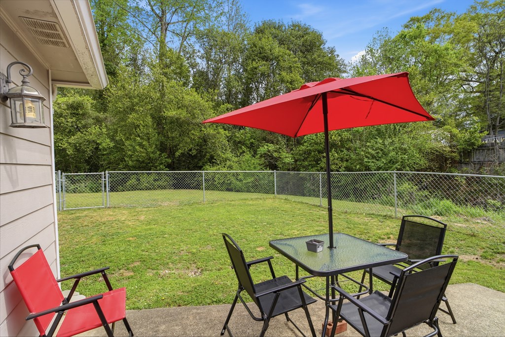 5019 Mccaghren Drive Columbus, GA 31909 - Photo 18 of 22 a view of a chair and table in the patio