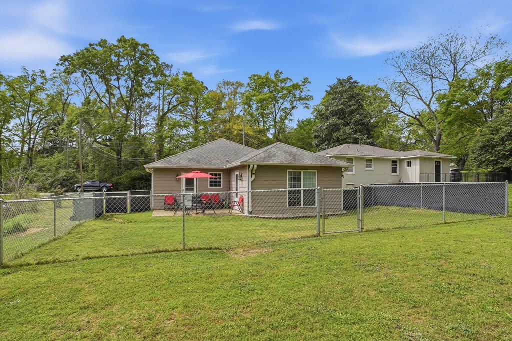 5019 Mccaghren Drive Columbus, GA 31909 - Photo 20 of 22 a view of a house with a yard