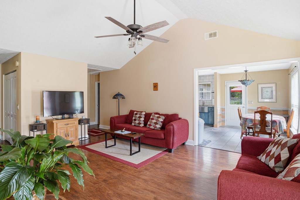5019 Mccaghren Drive Columbus, GA 31909 - Photo 3 of 22 a living room with furniture and a flat screen tv