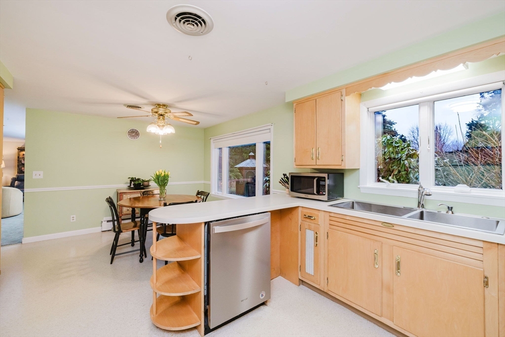 15 Ralsie Road Rehoboth, MA 02769 - Photo 12 of 32 a kitchen with a sink and cabinets