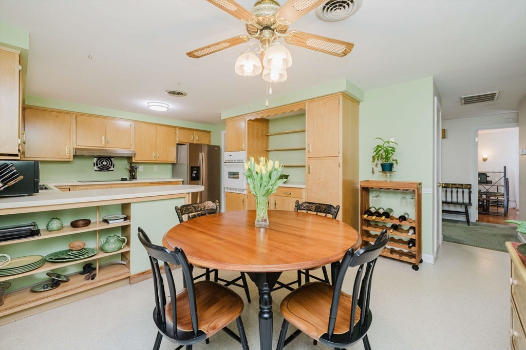 15 Ralsie Road Rehoboth, MA 02769 - Photo 14 of 32 a view of a dining room with furniture and a chandelier