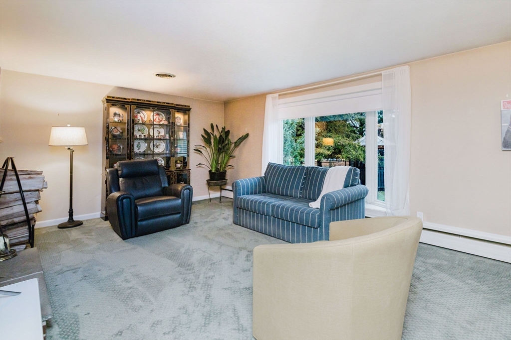 15 Ralsie Road Rehoboth, MA 02769 - Photo 15 of 32 a living room with furniture and a large window