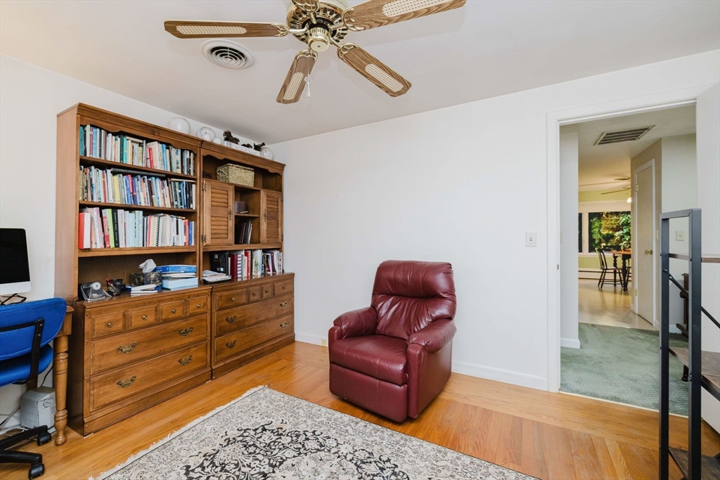 15 Ralsie Road Rehoboth, MA 02769 - Photo 20 of 32 a room with a couch and a bookshelf