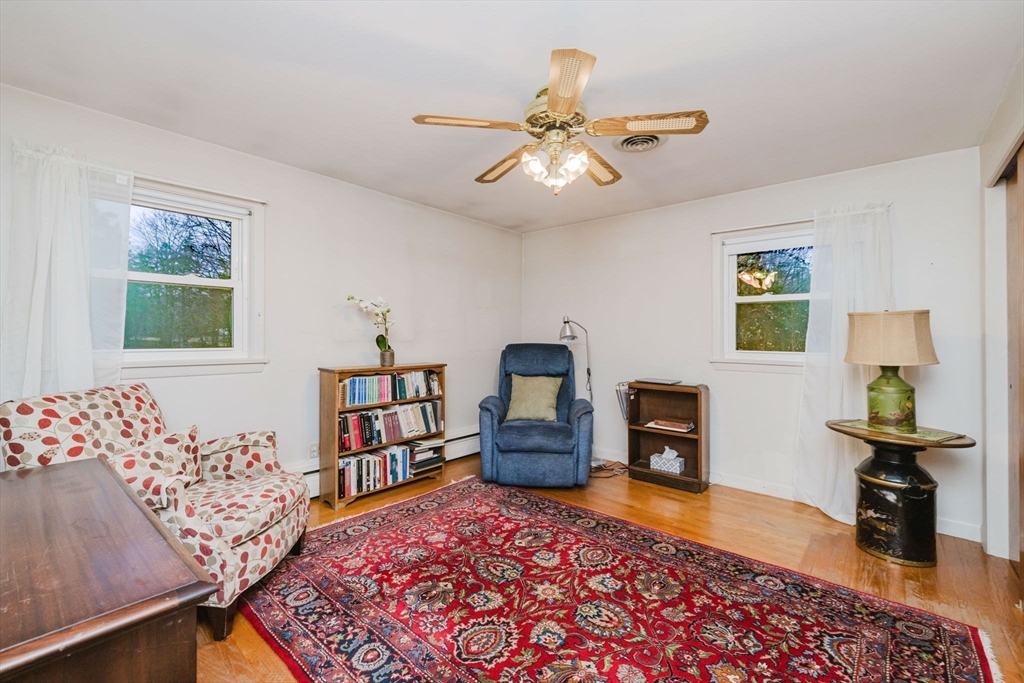 15 Ralsie Road Rehoboth, MA 02769 - Photo 22 of 32 a bedroom with furniture and a book shelf