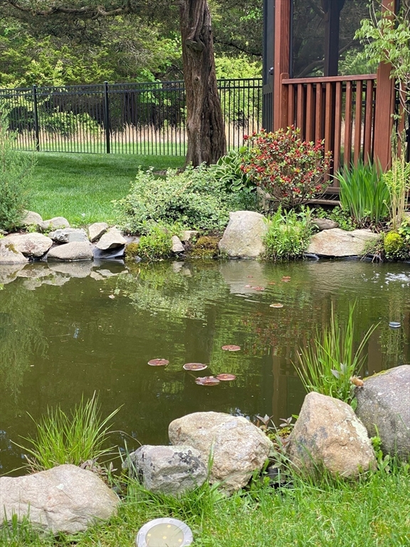 15 Ralsie Road Rehoboth, MA 02769 - Photo 30 of 32 a view of a lake with a garden