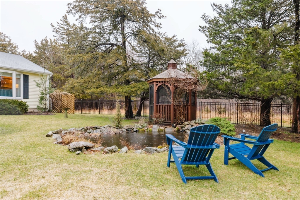 15 Ralsie Road Rehoboth, MA 02769 - Photo 5 of 32 a view of a house with backyard porch and sitting area