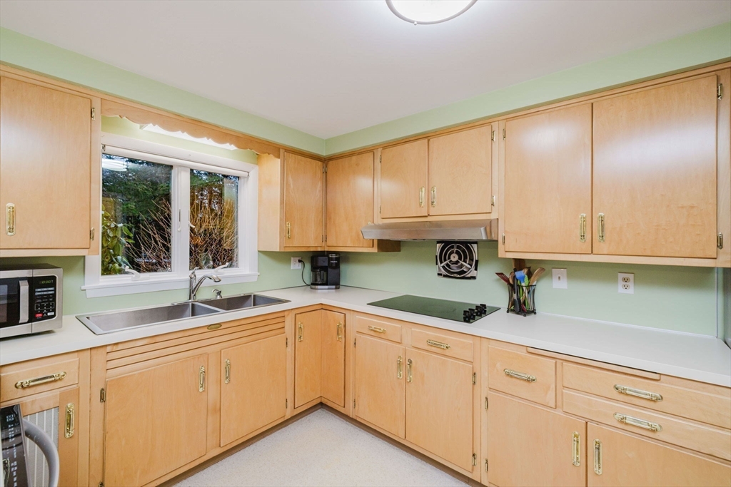 15 Ralsie Road Rehoboth, MA 02769 - Photo 10 of 32 a kitchen with a sink cabinets and window