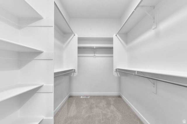 3016 West 2650 North Clinton, UT 84015 - Photo 19 of 20 Walk in closet with light colored carpet