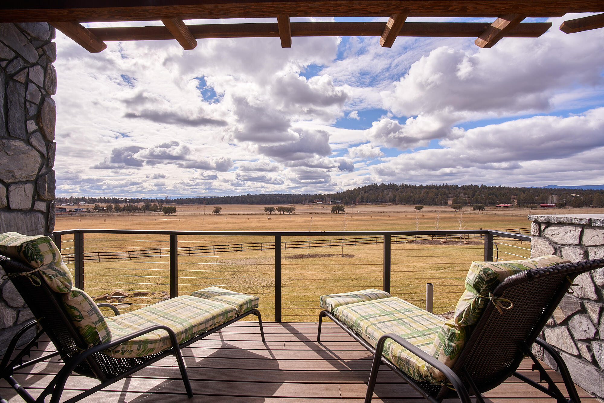 19525 Innes Market Road Bend, OR 97703 - Photo 30 of 56 a view of a terrace with seating space