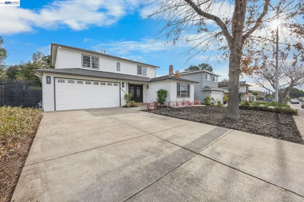 a house with trees in front of it
