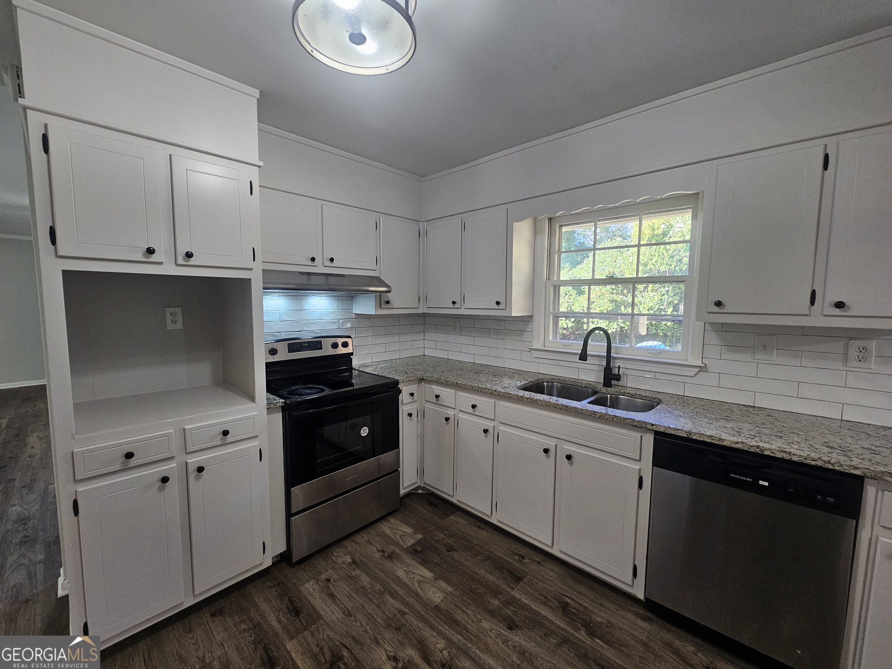 3750 Citation Drive Decatur, GA 30034 - Photo 25 of 44 a kitchen with a sink stove and cabinets